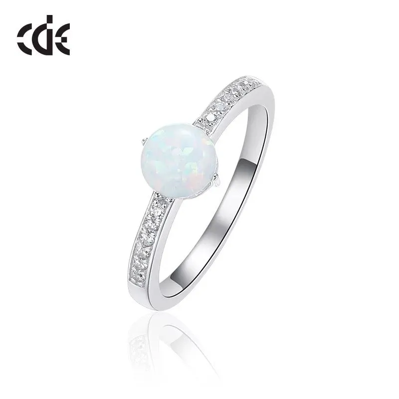 Sterling silver elegant blue opal with little crystals ring